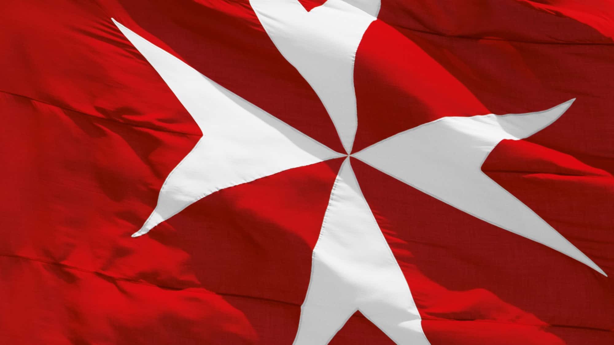 Die Johanniter - Die Johanniter zeigen Flagge. Schliesske stellt eine 900 Jahre alte Marke neu auf